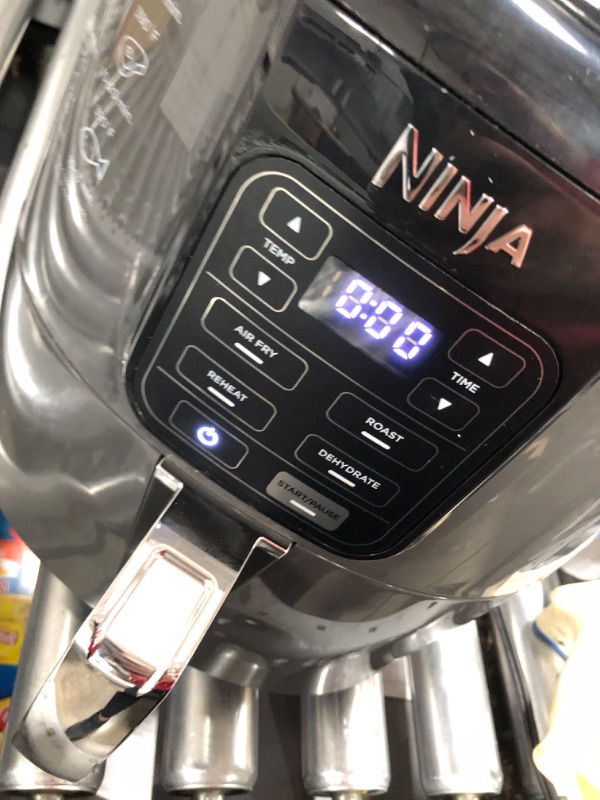 Photo 6 of ***USED***
Ninja AF101 Air Fryer that Crisps, Roasts, Reheats, & Dehydrates, for Quick, Easy Meals, 4 Quart Capacity, & High Gloss Finish, Black/Grey 4 Quarts