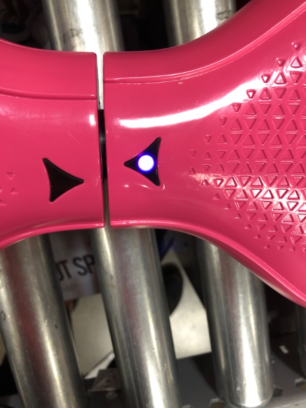 Photo 7 of **PARTS ONLY***
Hover-1 i-200 Electric Hoverboard | 7MPH Top Speed, 6 Mile Range, 6HR Full-Charge, Built-in Bluetooth Speaker, Rider Modes: Beginner to Expert, Pink
***DONT TURN ON***