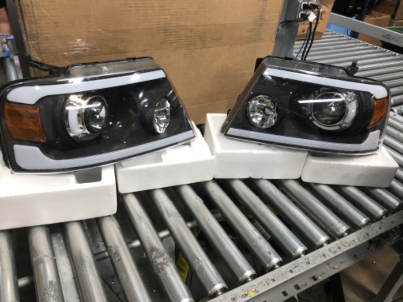 Photo 2 of **MINOR WEAR & TEAR**oEdRo LED Headlight Assembly for 2004-2008 Ford F150 F-150 Headlamps w/LED Bulbs Sequential Turn Signal DRL Clear Lens Pair Projector & LED w/ Turn Signal - Black Housing Projector & LED w/ Turn Signal (Bulb Included)