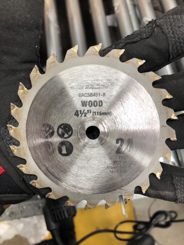 Photo 3 of **MINOR TEAR & WEAR**Genesis GCS445SE 4.0 Amp 4-1/2" Compact Circular Saw with 24T Carbide-Tipped Blade, Rip Guide, Vacuum Adapter, and Blade Wrench & GACSB452 4 1/2" 60-Teeth High Speed Steel Circular Saw Blade Saw + Saw Blade