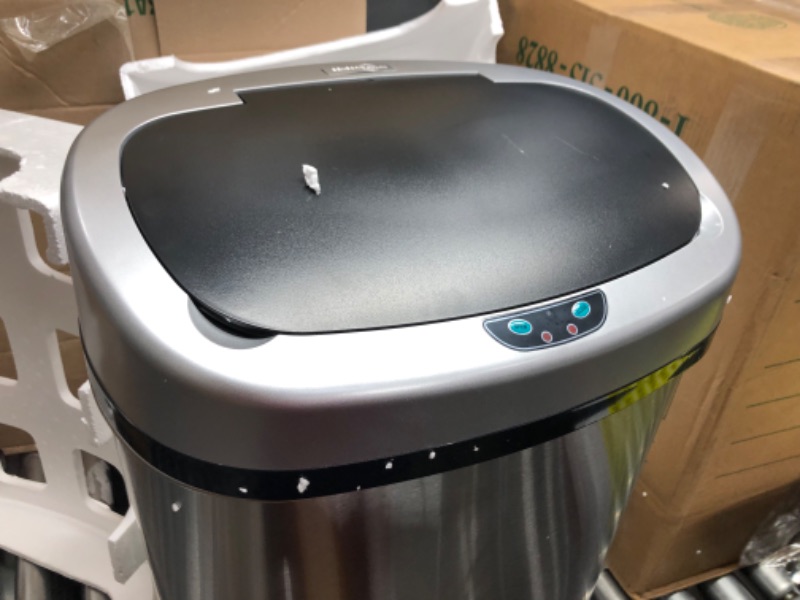 Photo 2 of **MINOR SHIPPING DAMAGE** iTouchless 13 Gallon SensorCan Kitchen Trash Can with Odor Filter, Stainless Steel, Oval Shape, Sensor-Activated Lid Garbage Bin for Home, Office, Slim Space-Saving, Battery & AC Adapter not included Oval Stainless Steel