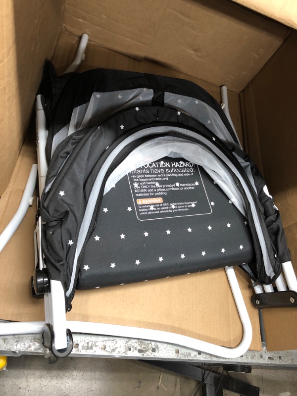 Photo 1 of Dream On Me Karley Bassinet in Onyx, Lightweight Portable Baby Bassinet, Quick Fold and Easy to Carry , Adjustable Double Canopy, Indoor and Outdoor Bassinet with Large Storage Basket.
