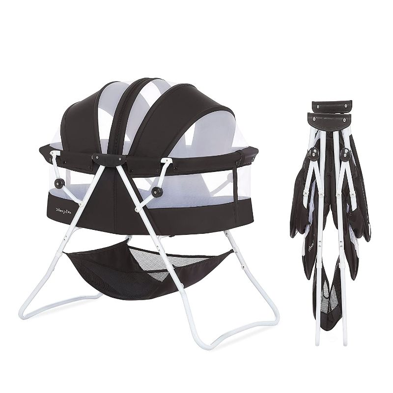 Photo 1 of **MISSING PARTS** Dream On Me Karley Bassinet in Black, Lightweight Portable Baby Bassinet, Quick Fold and Easy to Carry , Adjustable Double Canopy, Indoor and Outdoor Bassinet with Large Storage Basket.
