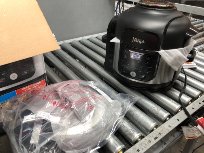 Photo 4 of *New** Ninja FD302 Foodi 11-in-1 Pro 6.5 qt. Pressure Cooker & Air Fryer that Steams, Slow Cooks, Sears, Sautés, Dehydrates & More, with 4.6 qt. Crisper Plate, Nesting Broil Rack & Recipe Book, Silver/Black 6.5 Quart Cooking Pot