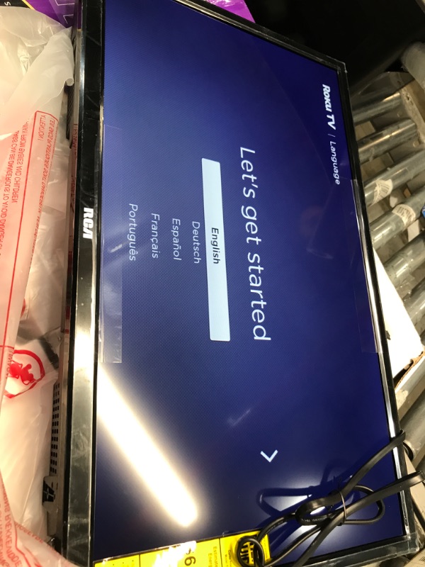 Photo 1 of RCA 24-inch Flat Screen 720p Roku Smart LED TV - RTR2461, 2022 Model