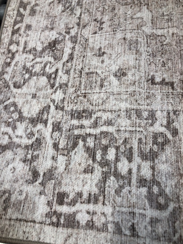 Photo 1 of 4'9"x6'9" Grey/ off White Patterned area rug 