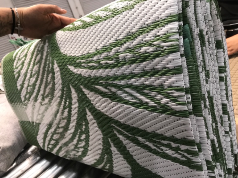 Photo 1 of 5X8FT  REVERSIBLE OUTDOOR RUG 