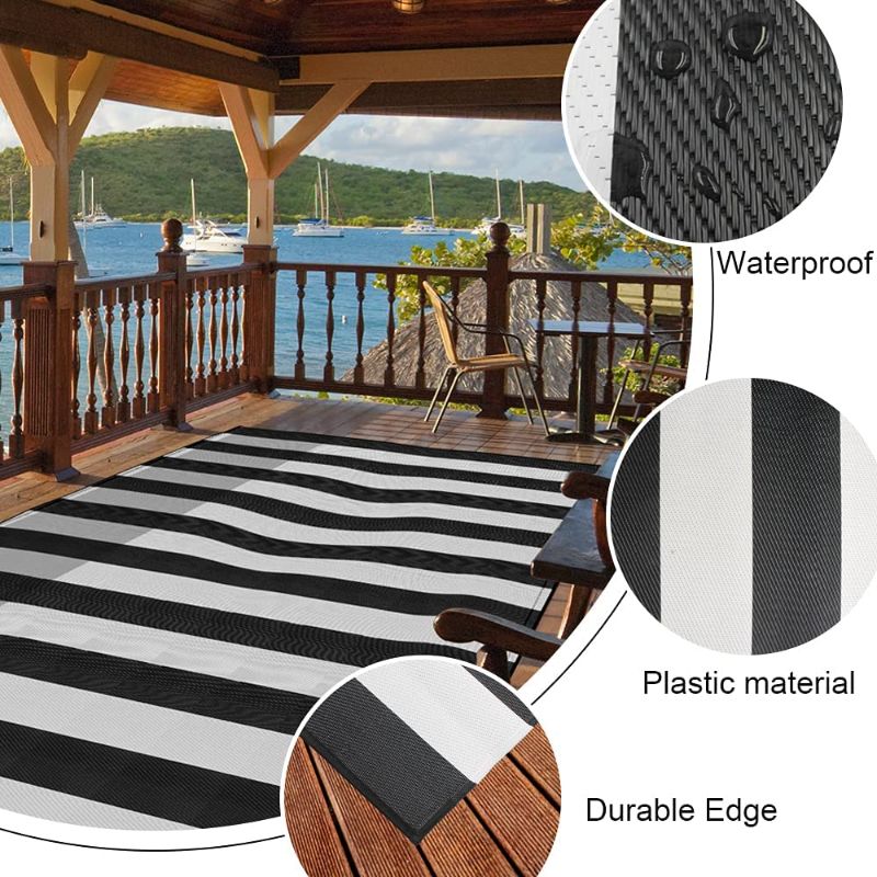 Photo 1 of  Plastic Straw Rug,Patio Rugs RV Camping Rug Reversible Mat,4'x6' Large Floor Mat and Rug for Outdoor,Black and White Stripes