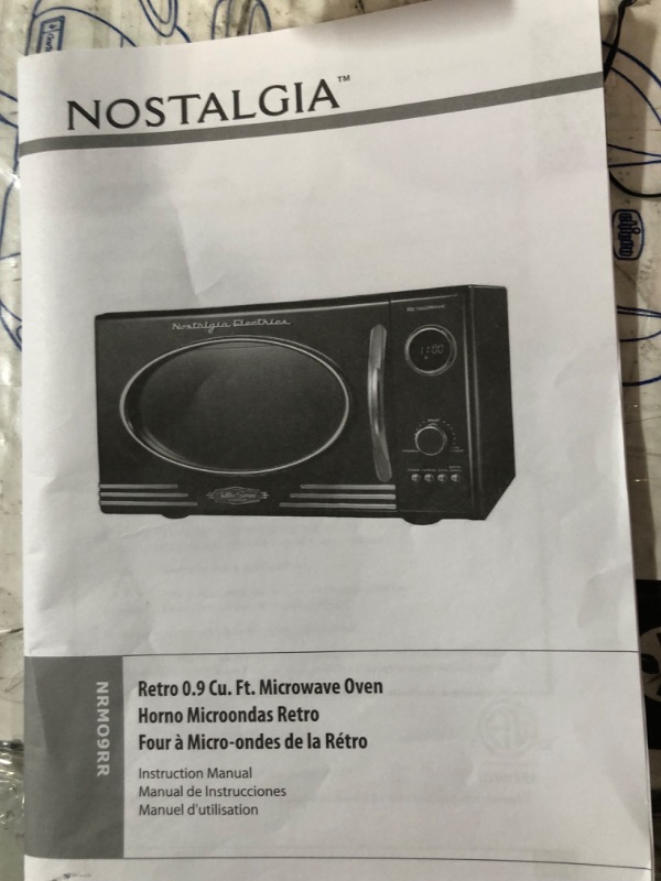 Photo 4 of ***NONFUNCTIONAL - DOES NOT TURN ON WHEN PLUGGED IN***
Nostalgia Retro Countertop Microwave Oven, 0.9 Cu. Ft. 800-Watts
