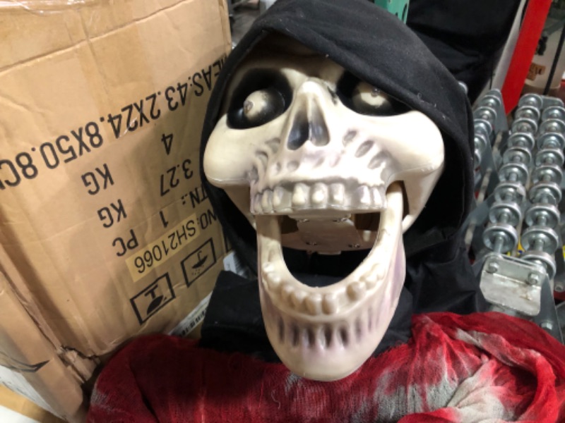 Photo 3 of Vmonke 6FT Skeleton Reaper Talking Scare Prop Animatronic for Indoor or Covered Outdoor Creepy Halloween Decoration (Death Skeleton)