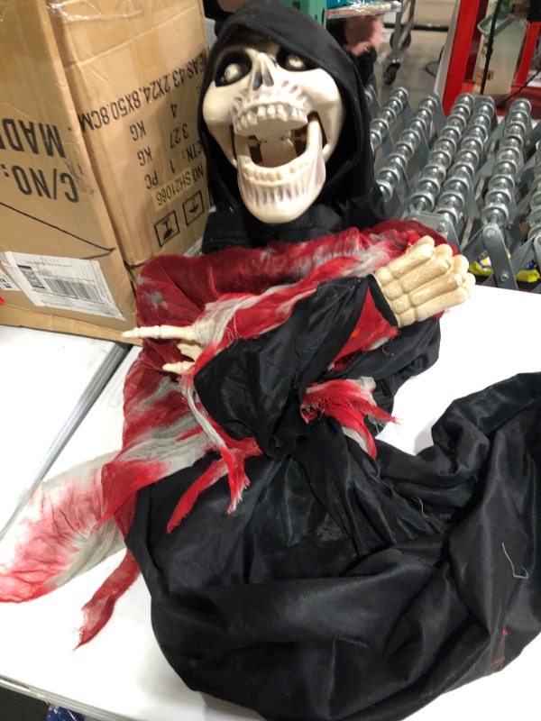 Photo 5 of Vmonke 6FT Skeleton Reaper Talking Scare Prop Animatronic for Indoor or Covered Outdoor Creepy Halloween Decoration (Death Skeleton)