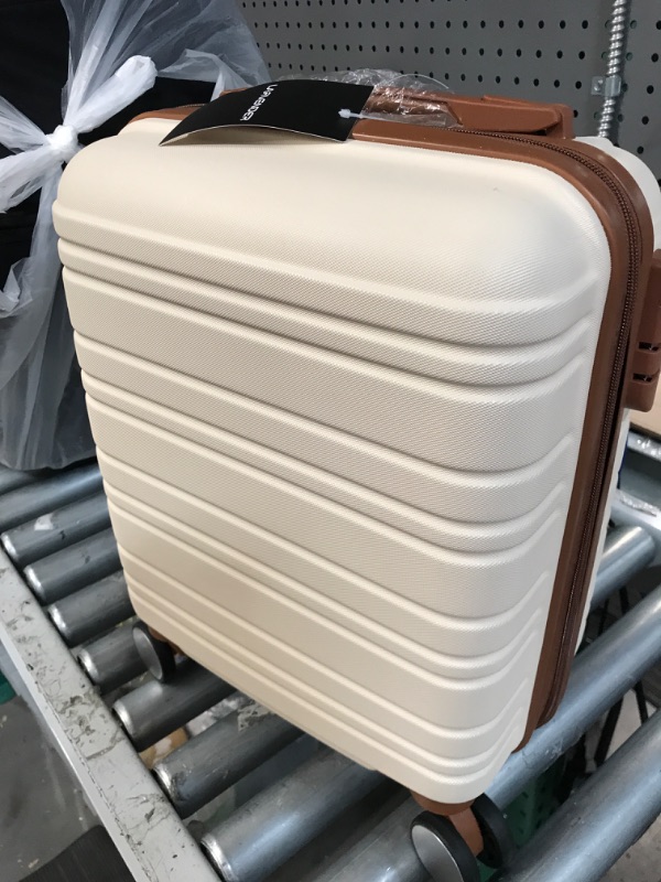 Photo 1 of * item used with minor damage *
16" stuicase/luggage cream color