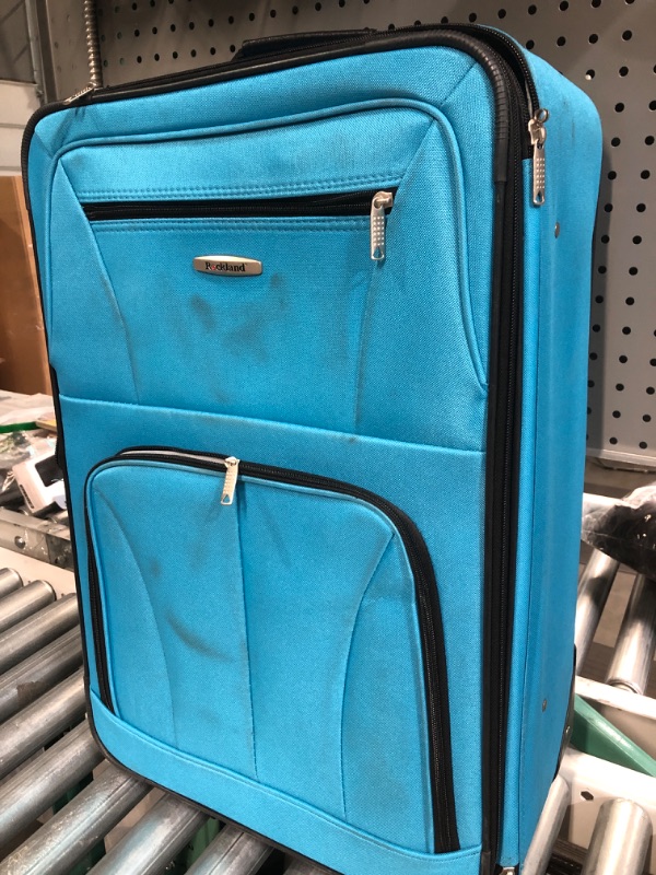 Photo 1 of 24" suitcase electric blue 