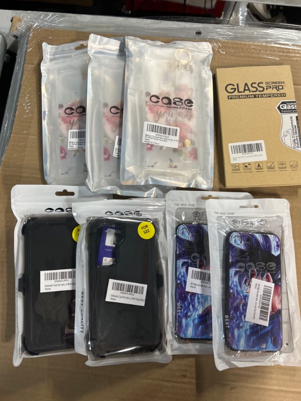 Photo 1 of **NON-REFUNDABLE, MISCELLANEOUS PHONE CASES/SCREEN PROTECTORS BUNDLE**