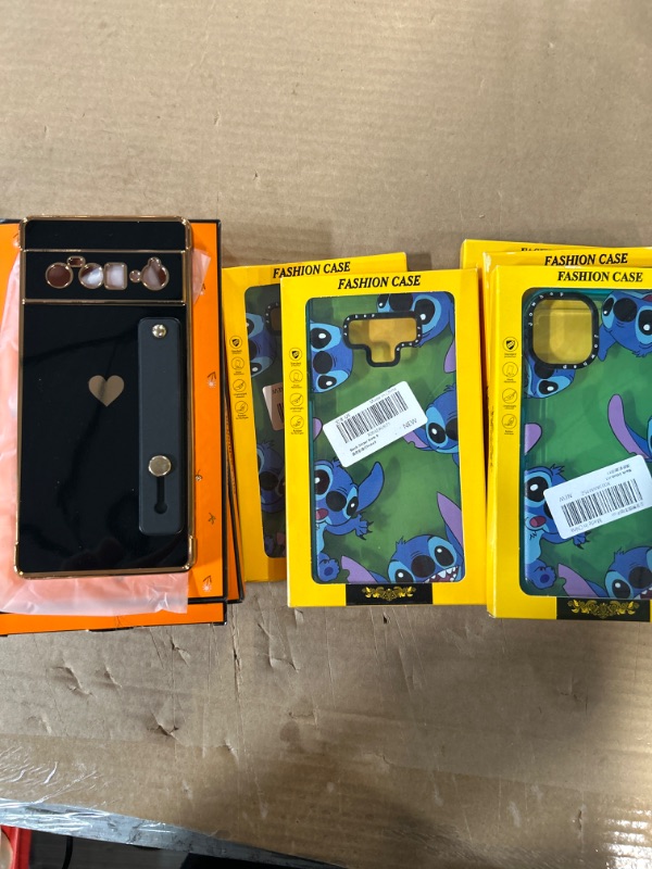 Photo 1 of **NON-REFUNDABLE, MISCELLANEOUS PHONE CASE BUNDLE**