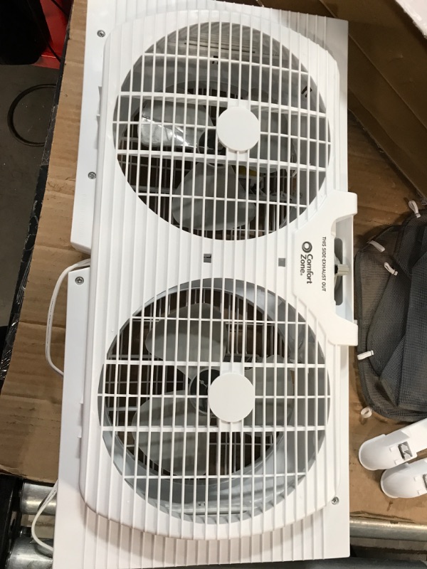 Photo 3 of ***ONE FAN SIDE NON-FUNCTIONAL, HALF FUNCTIONAL** Comfort Zone CZ319WT, White 9" Portable Twin Window Fan Window Fan