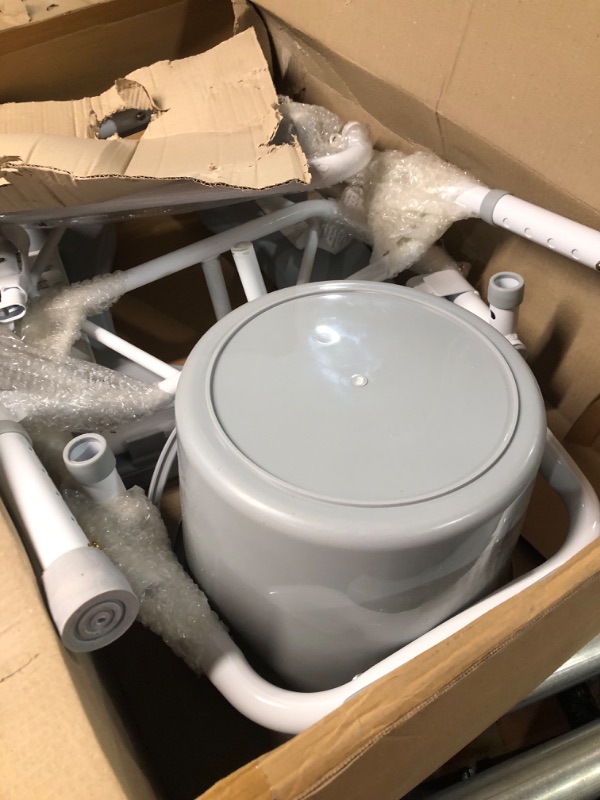 Photo 1 of Medline Drop Arm Commode, Swing Arm Rest for Easy Transfer, Padded Seat, Contains Chair, Pail, Lid, and Splash Guard, 350lb. Weight Capacity