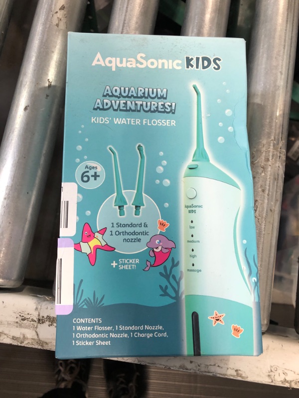 Photo 4 of AquaSonic Kids' Water Flosser for Ages 6+ | Standard Nozzle, Orthodontic Nozzle & Waterproof Stickers | 4 Flossing Modes | Aquarium Adventures Theme (Blue)