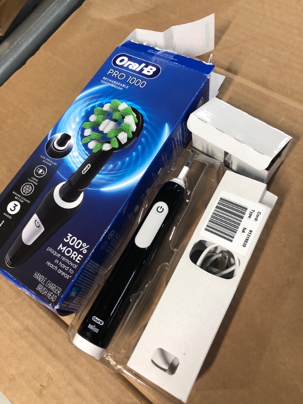 Photo 3 of Oral-B Pro 1000 Rechargeable Electric Toothbrush, Black
