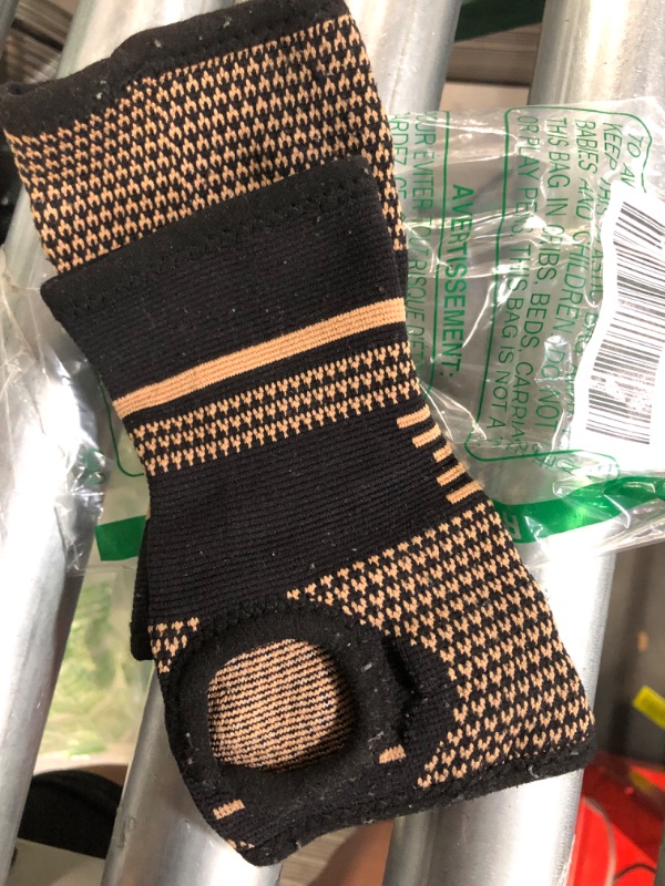 Photo 2 of Copper Wrist Compression Sleeves Medium Black