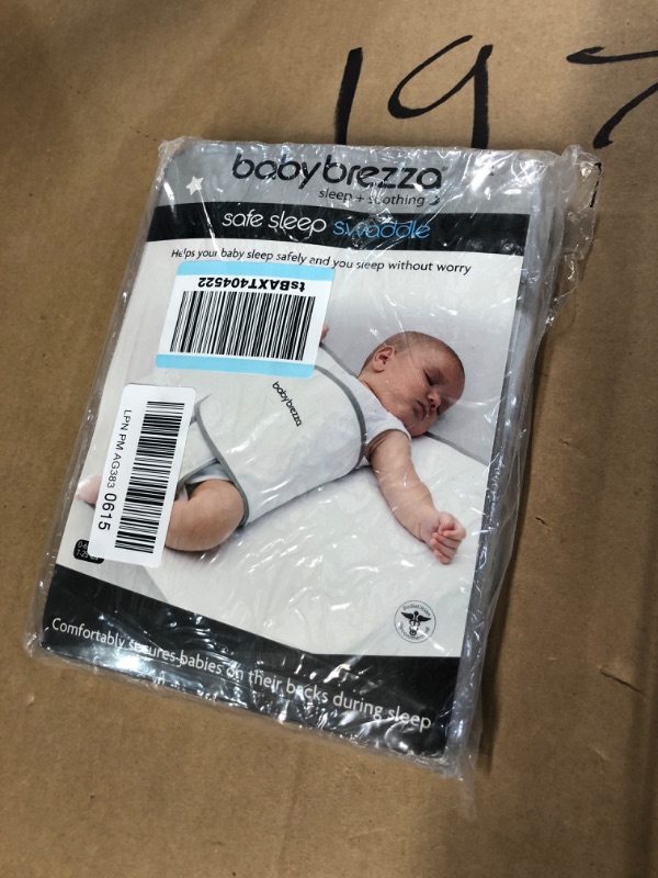 Photo 2 of Baby Brezza Safe Sleep Swaddle Blanket for Crib Safety for Newborns and Infants – Safe, Anti-Rollover Blanket in White, by Tranquilo Reste