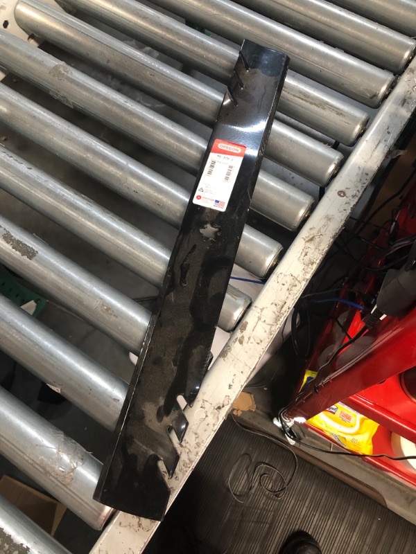 Photo 1 of **HEAVILY USED** Oregon Gator G3 Mulching Lawnmower Replacement Blade, 22-7/8" Length, 46" Deck (96-370 ),Black ONLY ONE BLADE 