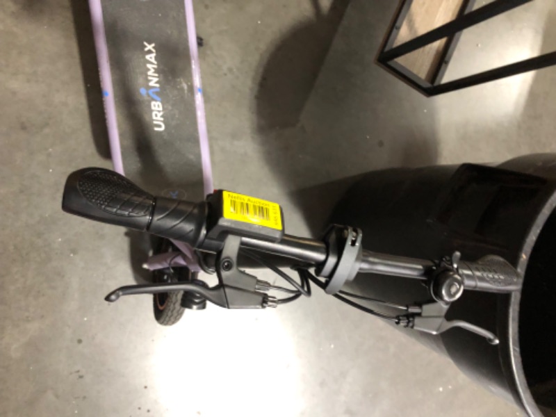 Photo 8 of **MAJOR DAMAGE TIRE IS FLAT-MISSING CHARGER UNTESTED**
C1/C1 Pro Electric Scooter with Seat, 450W Powerful Motor up to 22/25 Miles Range, Foldable Electric Scooter for Adults Max Speed 15.5/18.6 Mph, Electric Scooter for Commuting with Basket Purple C1 Sc