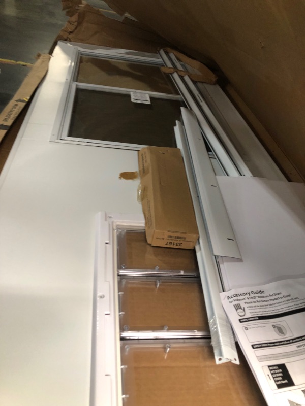 Photo 3 of ***USED - MAJOR DAMAGE - MISSING PARTS - SEE COMMENTS***
EMCO 32 in. x 80 in. White Universal 1/2 Light Pet Entry Aluminum Storm Door with Black Hardware