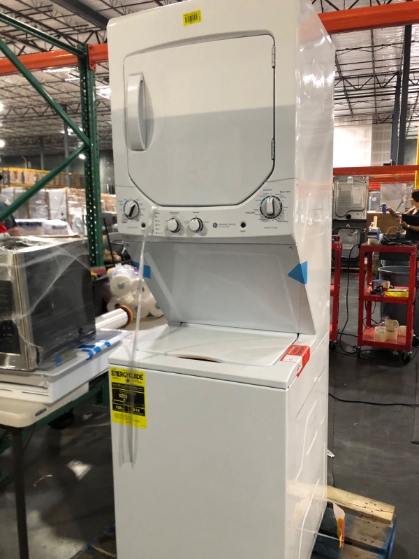 Photo 2 of GE Unitized Spacemaker® 2.3 cu. ft. Capacity Washer with Stainless Steel Basket and 4.4 cu. ft. Capacity Electric Dryer