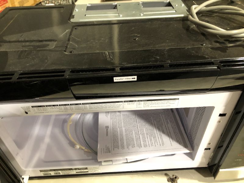 Photo 17 of ***SCRATCHED - BENT - SEE PICTURES***
Frigidaire 1.8 Cu. Ft. Over-The-Range Microwave