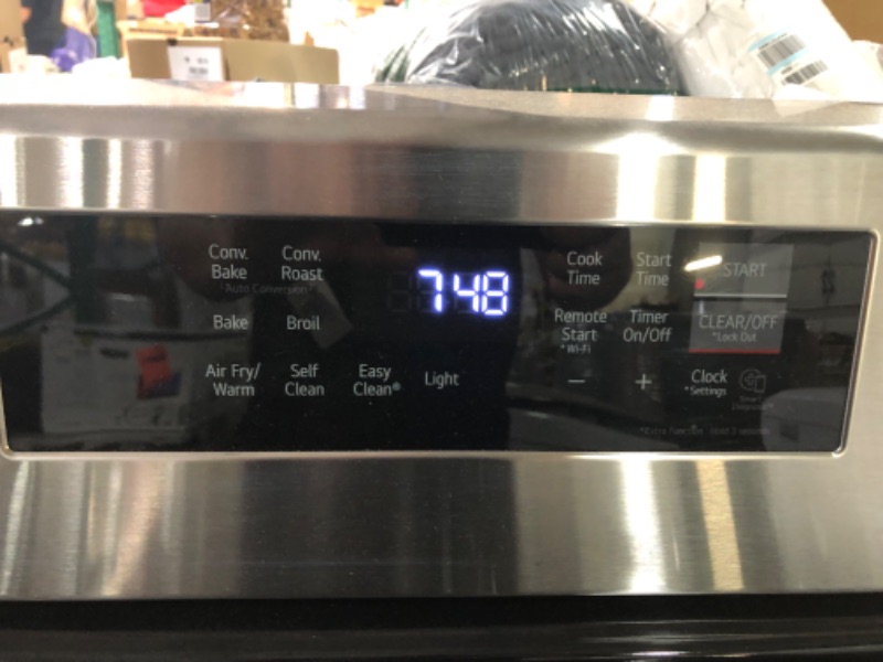 Photo 4 of **USED HAS DAMAGED TO TOP AND SOME PARTS** LG 30-in 5 Burners 5.8-cu ft Self-cleaning Air Fry Convection Oven Freestanding Smart Gas Range (Printproof Black Stainless Steel)