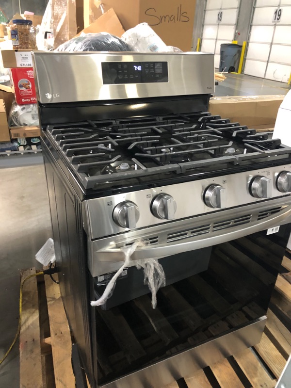 Photo 5 of **USED HAS DAMAGED TO TOP AND SOME PARTS** LG 30-in 5 Burners 5.8-cu ft Self-cleaning Air Fry Convection Oven Freestanding Smart Gas Range (Printproof Black Stainless Steel)