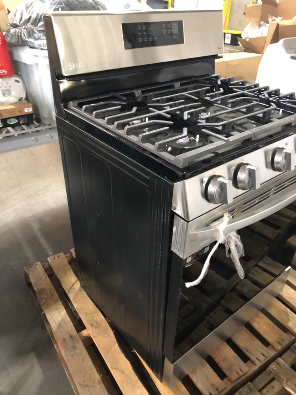 Photo 2 of **USED HAS DAMAGED TO TOP AND SOME PARTS** LG 30-in 5 Burners 5.8-cu ft Self-cleaning Air Fry Convection Oven Freestanding Smart Gas Range (Printproof Black Stainless Steel)