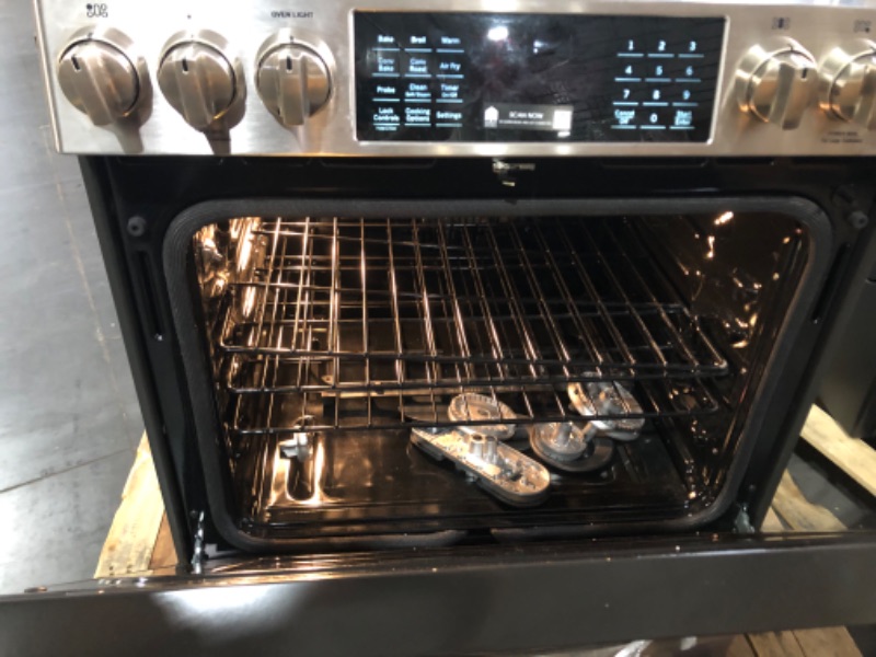 Photo 4 of GE Profile 30-in Deep Recessed 5 Burners Self and Steam Cleaning Air Fry Convection Oven Slide-in Smart Dual Fuel Range (Fingerprint-resistant Stainless Steel)