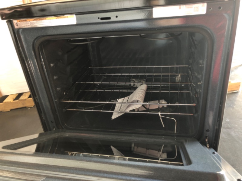 Photo 6 of **DAMAGED, SEE NOTES** Whirlpool 5.3 cu. ft. Electric Range with Keep Warm Setting.