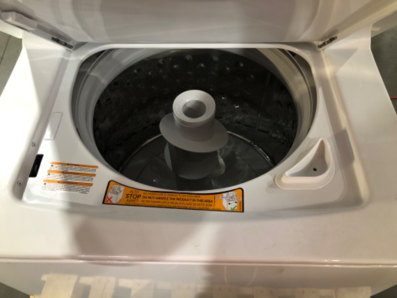 Photo 8 of **GAS DRYER** GE Unitized Spacemaker® 3.8 cu. ft. Capacity Washer with Stainless Steel Basket and 5.9 cu. ft. Capacity Gas Dryer