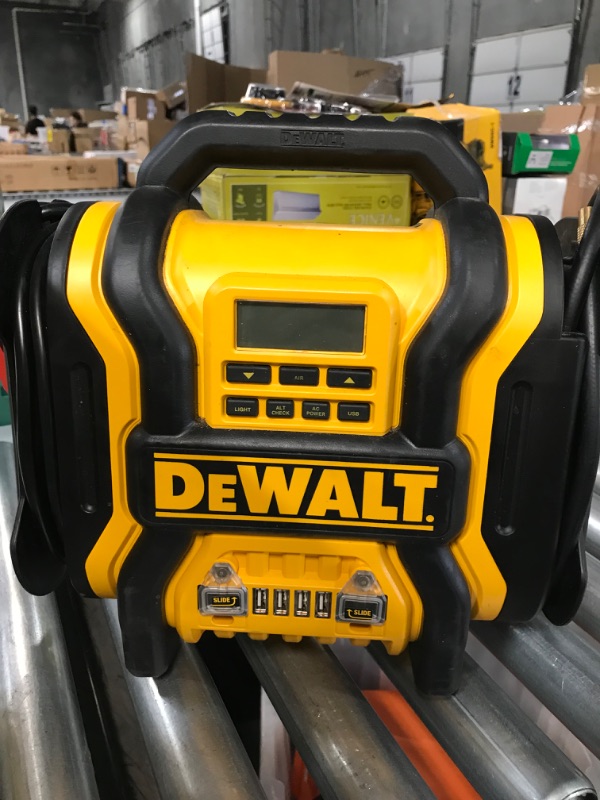 Photo 2 of DEWALT DXAEPS14 1600 Peak Battery Amp 12V Automotive Jump Starter/Power Station with 500 Watt AC Power Inverter, 120 PSI Digital Compressor, and USB Power , Yellow