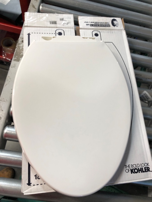 Photo 2 of **DAMAGE**KOHLER 4008-0 Reveal Elongated, Grip-Tight Bumpers, Quiet-Close Release Hinges, Quick-Attach Hardware, No Slam Toilet Seat, White White Elongated