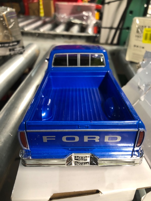 Photo 1 of 1979 Ford F-150 Pickup Truck Blue 1/24 Diecast Model Car by Motormax **SCRATCHED**
