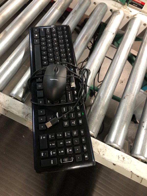 Photo 1 of AmazonBasics USB Wired Computer Keyboard and Wired Mouse **MISSING + KEY**