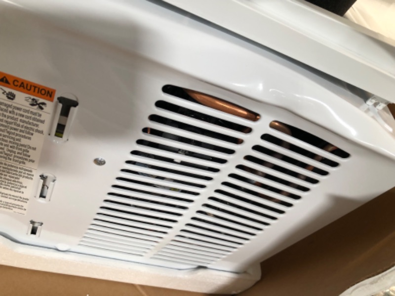 Photo 8 of **DENTED, SEE LAST PHOTO** GE AHV05LZ Window Air Conditioner with 5050 BTU Cooling Capacity, 115 Volts in White