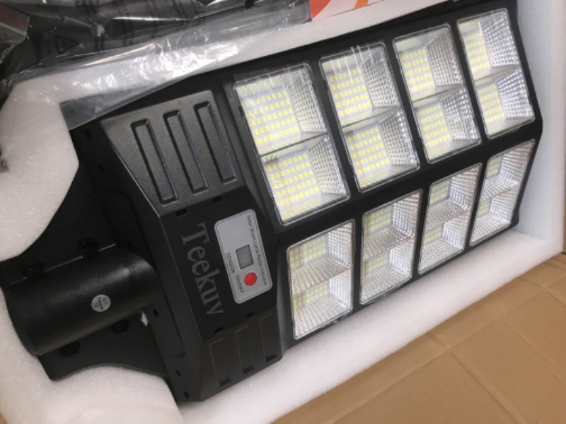 Photo 6 of **USED BUT APPEARS NEW** Teekuv 1200W Solar Street Lights Outdoor, 135000LM Commercial Parking Lot Light, 6000K Dusk to Dawn LED Solar Security Flood Lights with Motion Sensor 