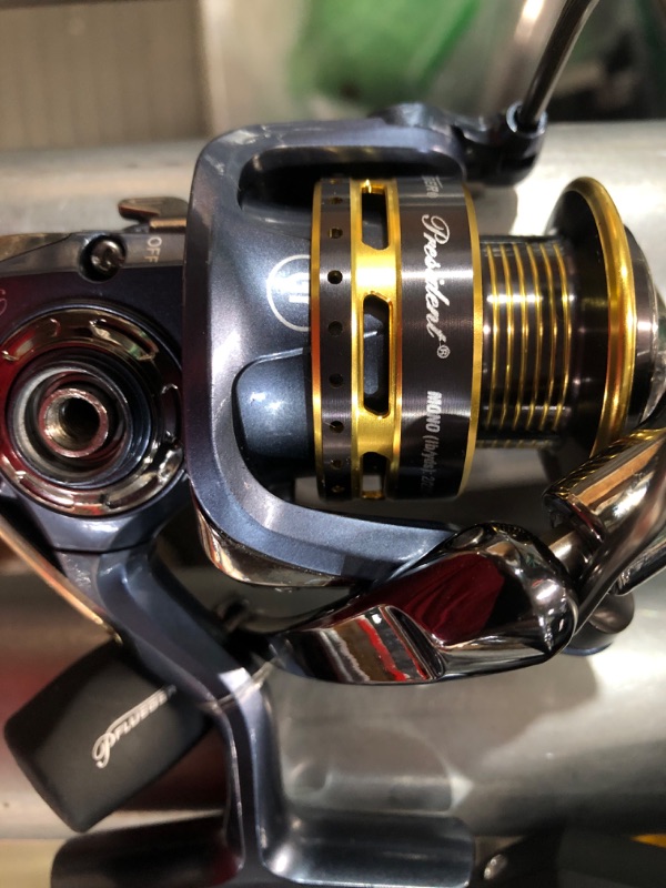 Photo 2 of **PIN BROKEN** Fishing Reel bundle