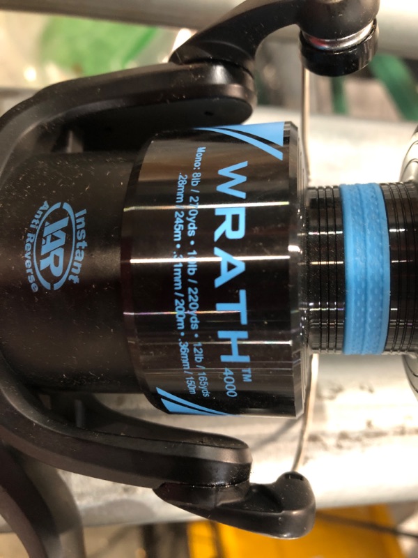 Photo 1 of **PIN BROKEN** Fishing Reel bundle