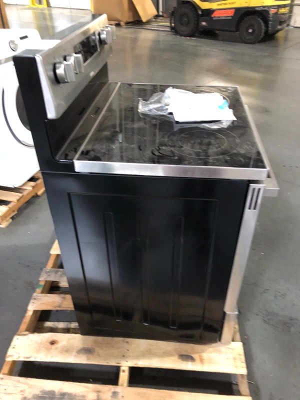 Photo 2 of **POWER LINES ARE CUT SAYS NON FUNCTIONAL**Whirlpool 30-in Smooth Surface 4 Elements 5.3-cu ft Freestanding Electric Range (Stainless Steel)
Item #1678247

Model #WFE320M0JS