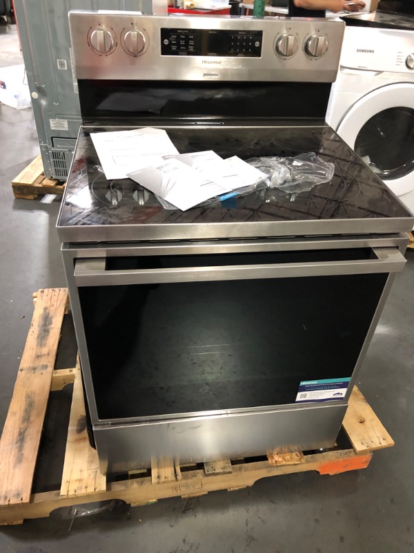 Photo 7 of **POWER LINES ARE CUT SAYS NON FUNCTIONAL**Whirlpool 30-in Smooth Surface 4 Elements 5.3-cu ft Freestanding Electric Range (Stainless Steel)
Item #1678247

Model #WFE320M0JS