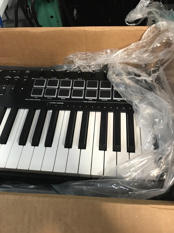 Photo 3 of M-Audio Oxygen 49 (MKV) – 49 Key USB MIDI Keyboard Controller With Beat Pads