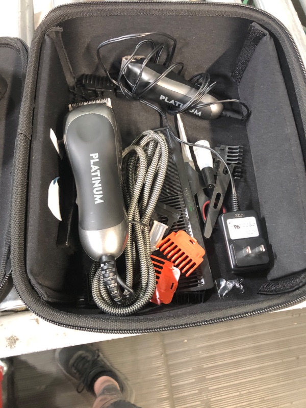 Photo 2 of * USED * 
Wahl USA Pro Series Platinum Corded Clipper & Corded Trimmer for Home Haircutting with Premium Secure Fit Color Coded Guide Combs – Model 79804-100