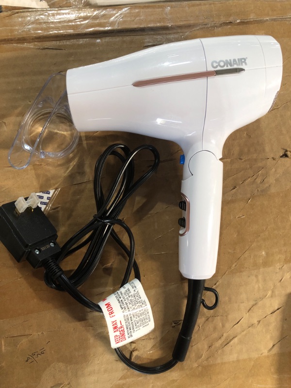 Photo 1 of Conair 1875 Watt Worldwide Travel Hair Dryer with Smart Voltage Technology and Folding