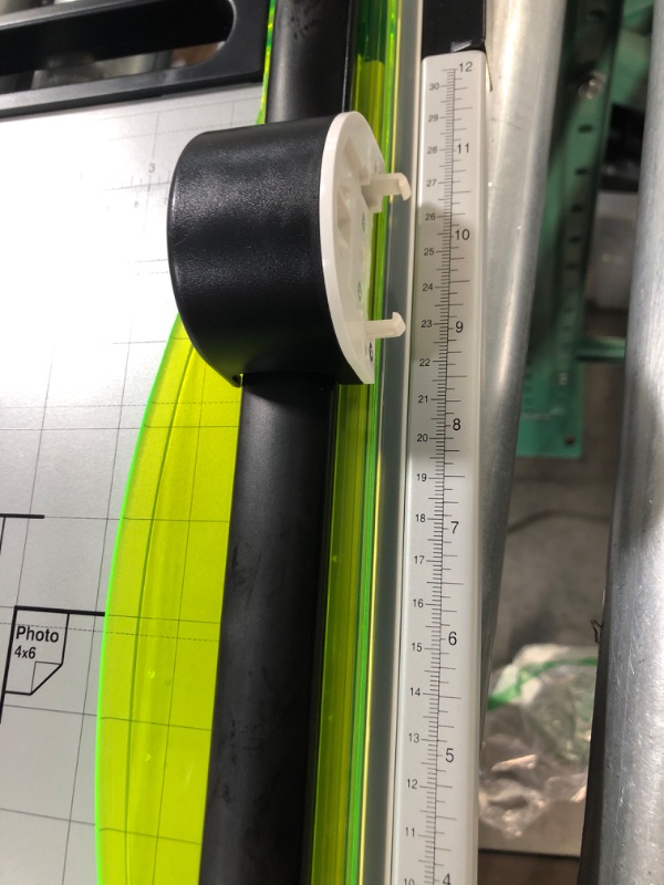 Photo 3 of SEE NOTES 
CARL 12 inch-Green Friendly, Professional Rotary Paper Trimmer, 12-inch, 15 Sheet Cutting Capacity, Black and Silver